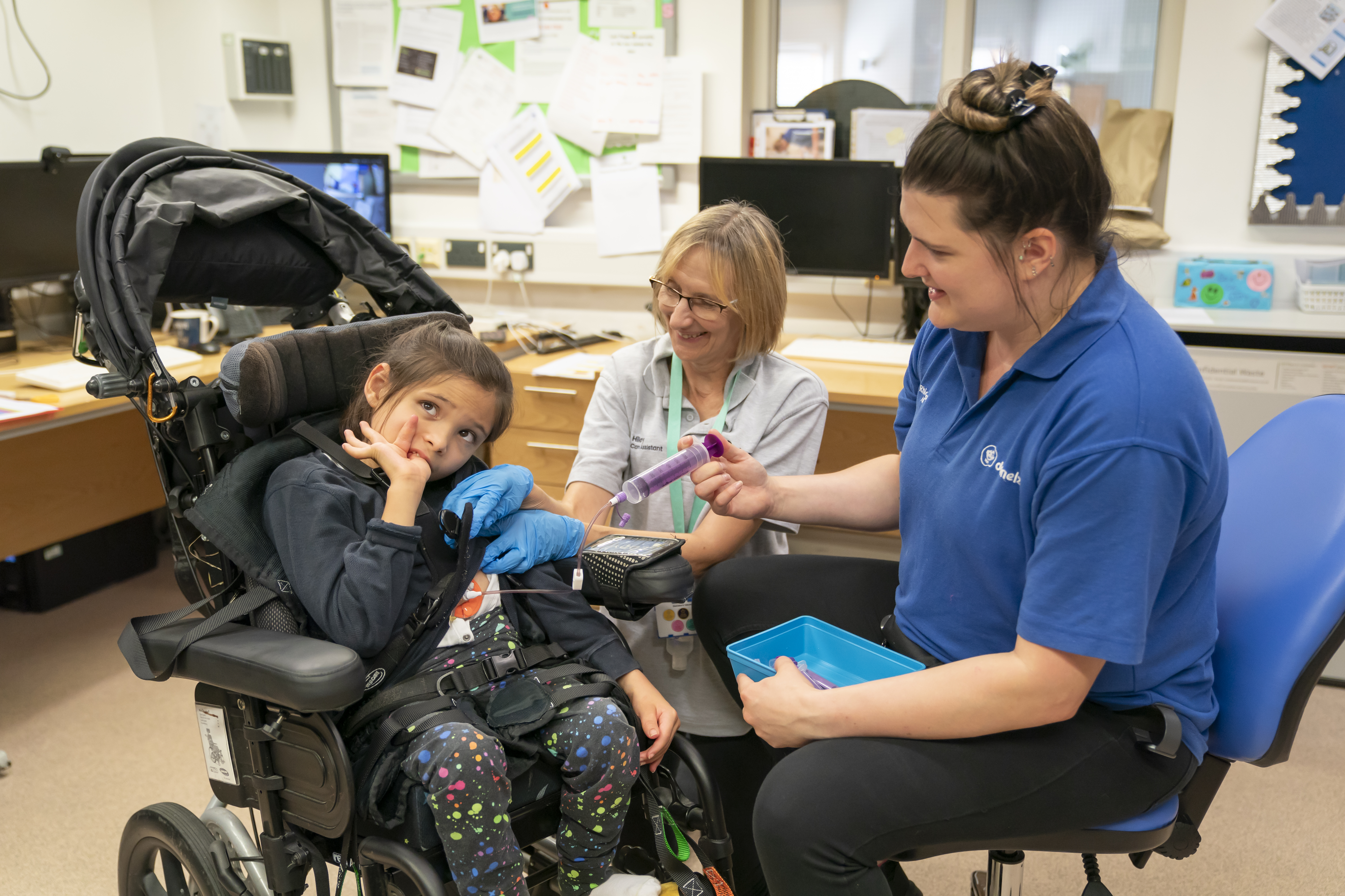 Nurse giving care to young person