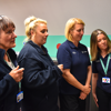 Demelza nurses at East Sussex looking at a screen