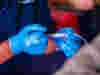Nurse administering medicine