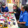 A child having creative arts therapy with Demelza nurses