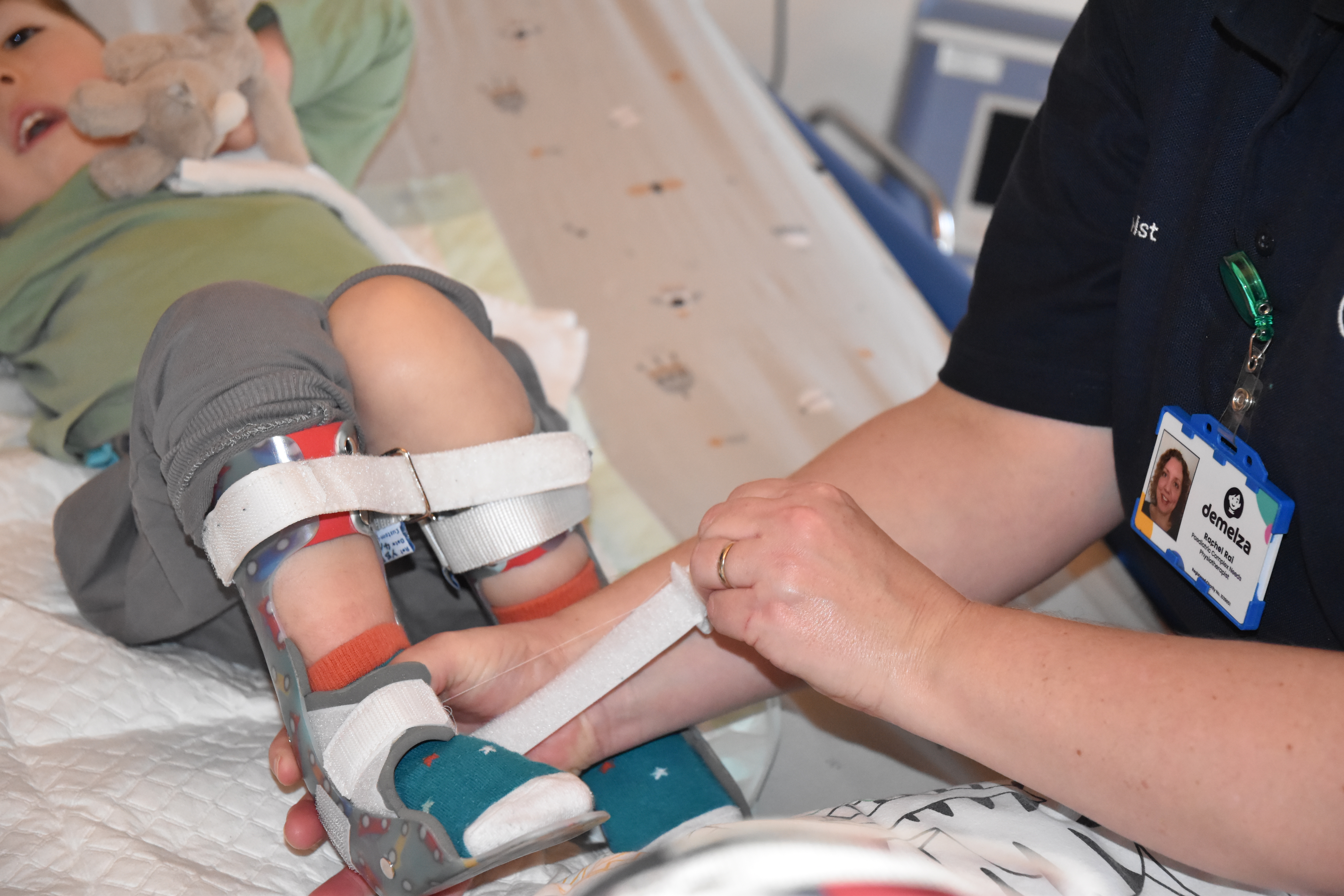 Image of a young person having a splint adjusted